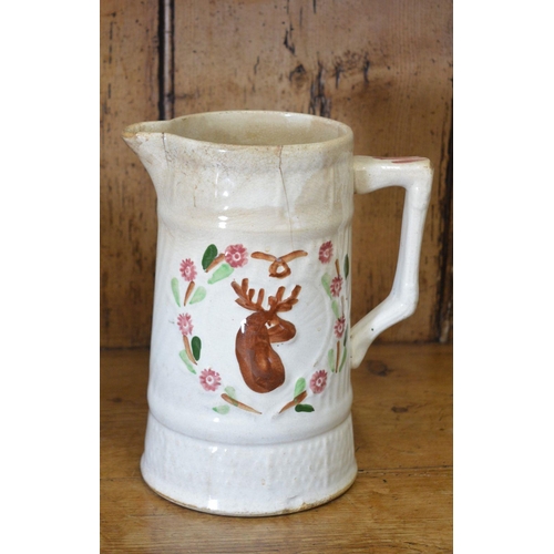 109 - LARGE POTTERY DAIRY JUG