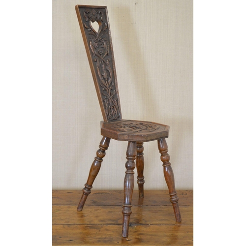 153 - CARVED ARTS AND CRAFTS CHAIR