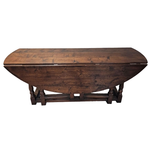 477 - 17TH-CENTURY STYLE OAK GATE LEG DINING TABLE