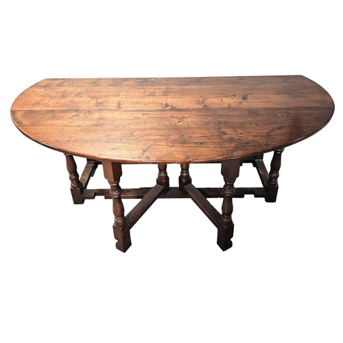 477 - 17TH-CENTURY STYLE OAK GATE LEG DINING TABLE