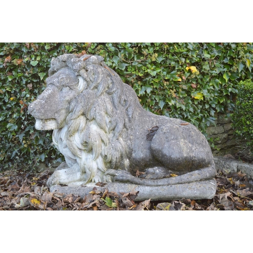 259 - PAIR OF LARGE MOULDED STONE LIONS.