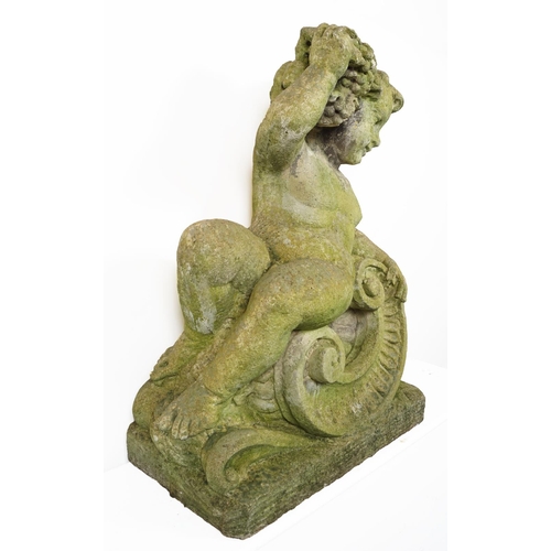 27 - PAIR COMPOSITE STONE PUTTI