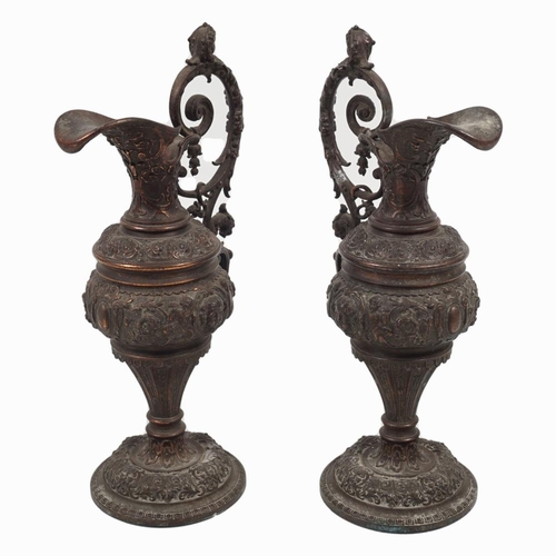 620 - PAIR 19TH-CENTURY METAL EWERS