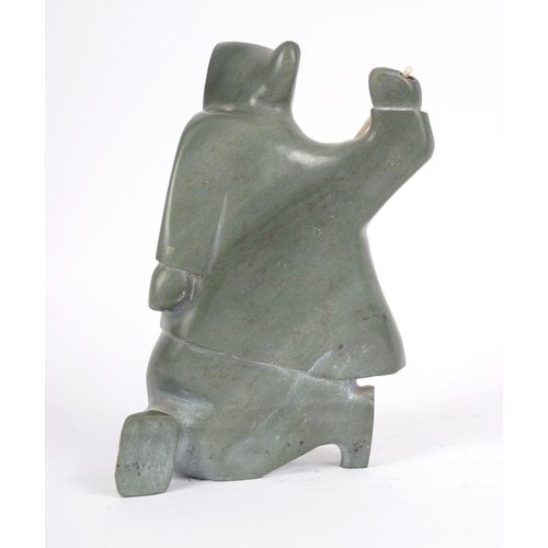 253 - INUIT STONE CARVING OF A FISHERMAN