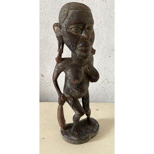 106 - EARLY AFRICAN CARVED FEMALE FIGURE