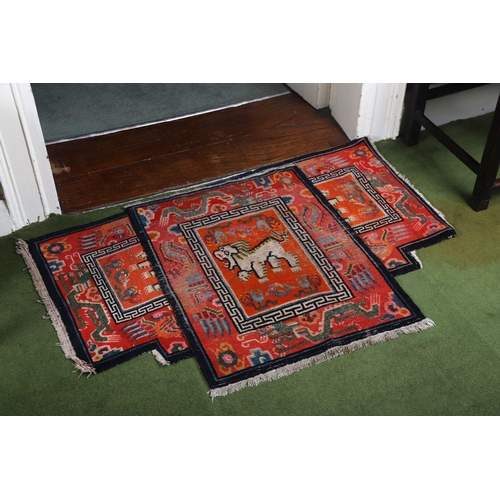 1075 - 19TH-CENTURY CHINESE SADDLE RUGS