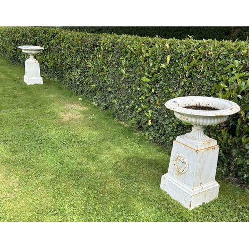 1332 - PAIR 19TH-CENTURY CAST IRON URNS ON PEDESTALS