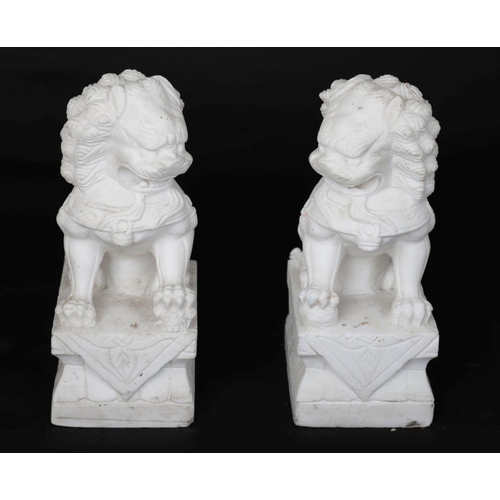 205 - PAIR SCULPTED MARBLE FOO DOGS