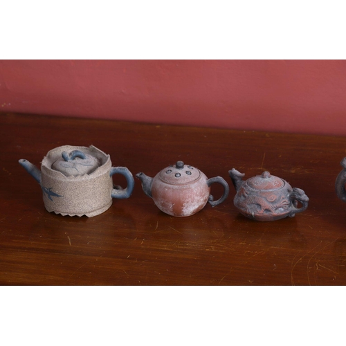 299 - GROUP OF 5 CHINESE YIXING TEAPOTS