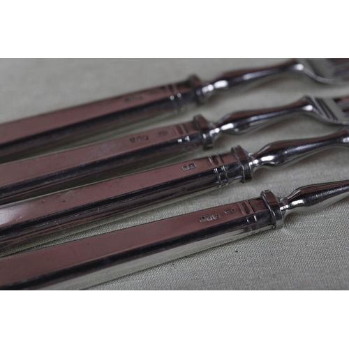 359 - 4 IRISH SILVER HANDLED FRUIT FORKS