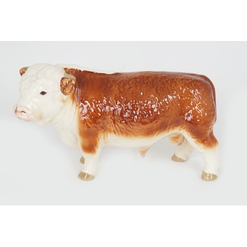 48 - BESWICK CERAMIC MODEL OF A BULL