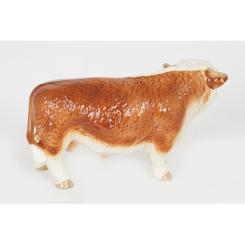 48 - BESWICK CERAMIC MODEL OF A BULL