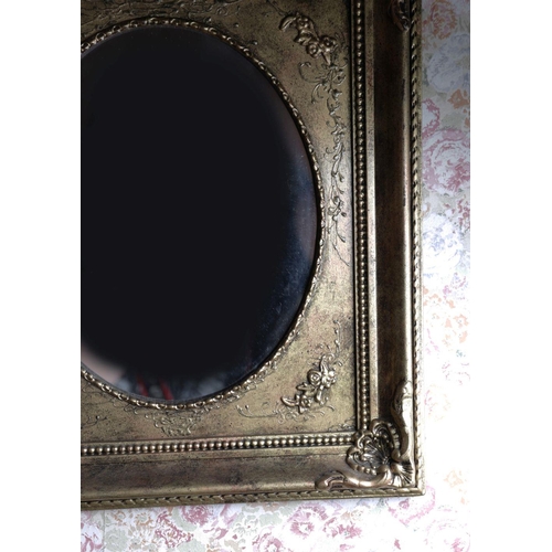 606 - SMALL GILT FRAMED MIRROR