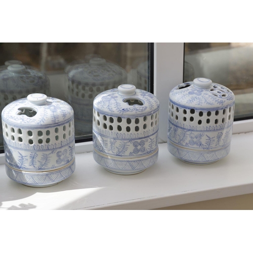 823 - GROUP OF 4 BLUE & WHITE TABLE CANDLE LANTERNS