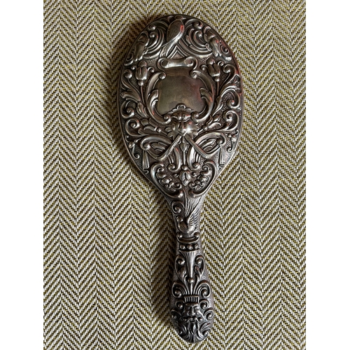 1422 - 19TH-CENTURY SILVER-BACKED VANITY MIRROR with embossed scroll decoration. Birmingham, 1907.