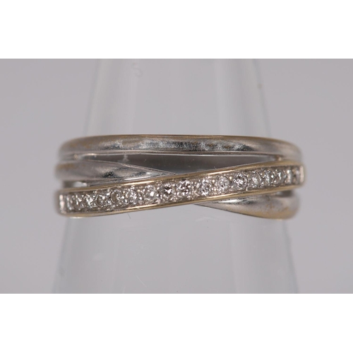 1115 - 18K WHITE GOLD DIAMON CROSS WAVE BAND