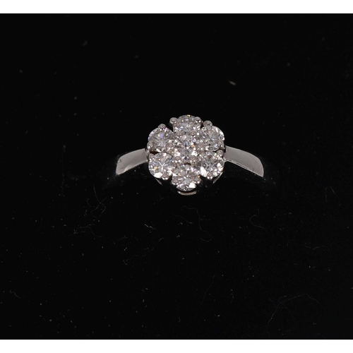 1116 - 18K WHITE GOLD AND DIAMOND CLUSTER RING