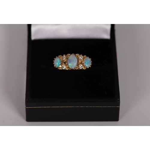 1154 - 18K YELLOW GOLD 3 STONE OPAL AND DIAMOND RING