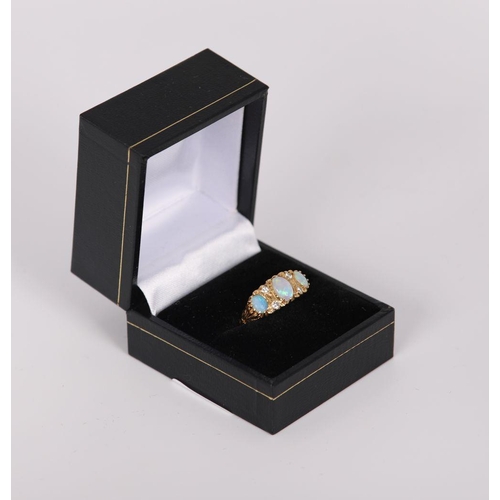 1154 - 18K YELLOW GOLD 3 STONE OPAL AND DIAMOND RING