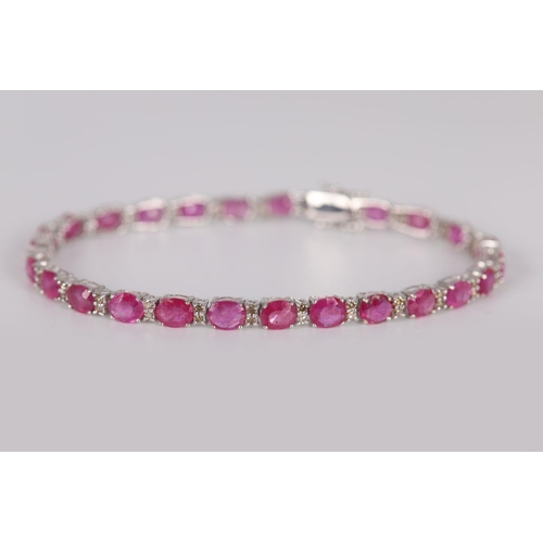 1192 - 18K WHITE GOLD RUBY & DIAMOND TENNIS BRACELET