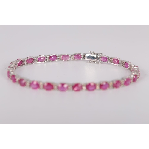 1192 - 18K WHITE GOLD RUBY & DIAMOND TENNIS BRACELET