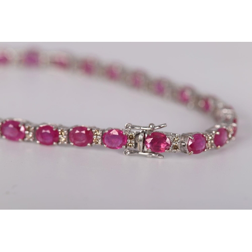 1192 - 18K WHITE GOLD RUBY & DIAMOND TENNIS BRACELET