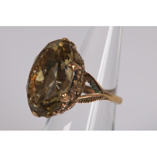 1193 - 9K YELLOW GOLD SMOKY TOPAZ RING