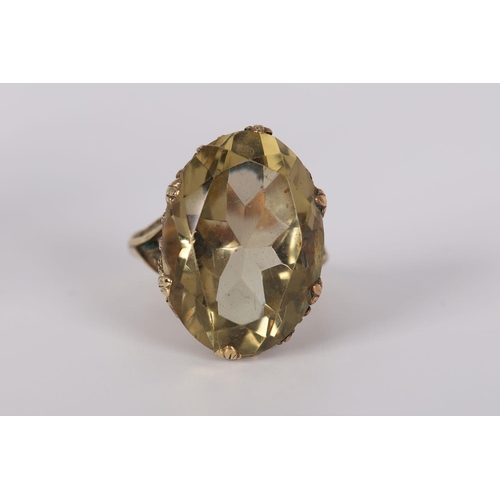 1193 - 9K YELLOW GOLD SMOKY TOPAZ RING