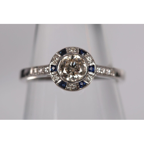 1266 - 18K WHITE GOLD SAPPHIRE & DIAMOND TARGET RING