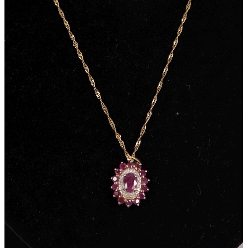 1281 - 9K GOLD CHAIN WITH RUBY AND DIAMOND PENDANT