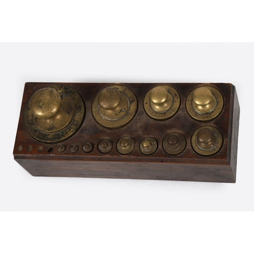 1587 - SET OF 12 GRADUATED BRASS (GOLD) WEIGHTS