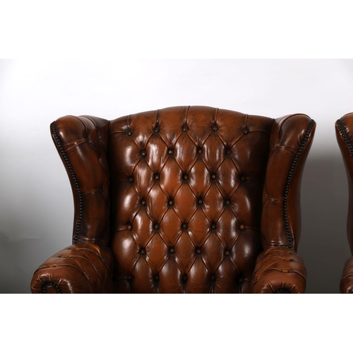 193 - PAIR HIDE UPHOLSTERED WING BACK ARMCHAIRS