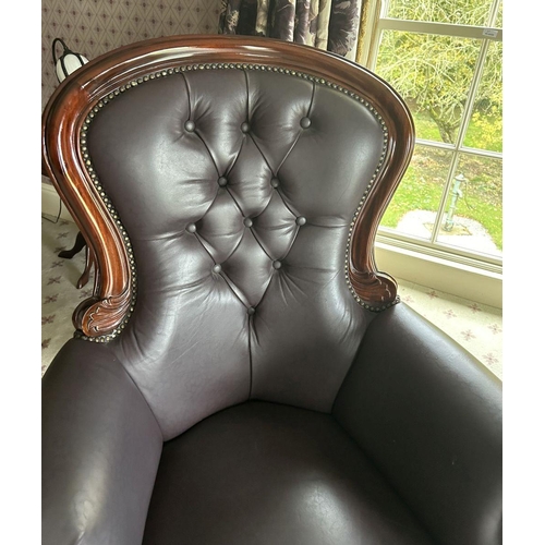 311 - LEATHER UPHOLSTERED ARMCHAIR