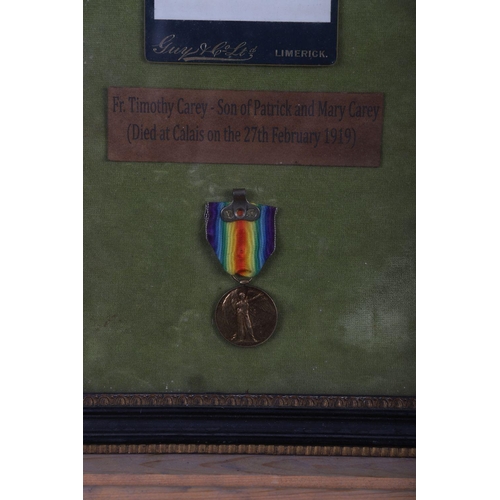 534 - FRAMED PHOTOGRAPH OF WWI VICTORY MEDAL