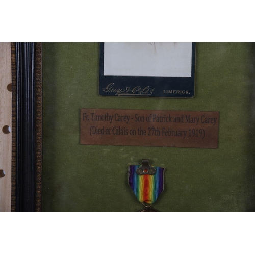 534 - FRAMED PHOTOGRAPH OF WWI VICTORY MEDAL