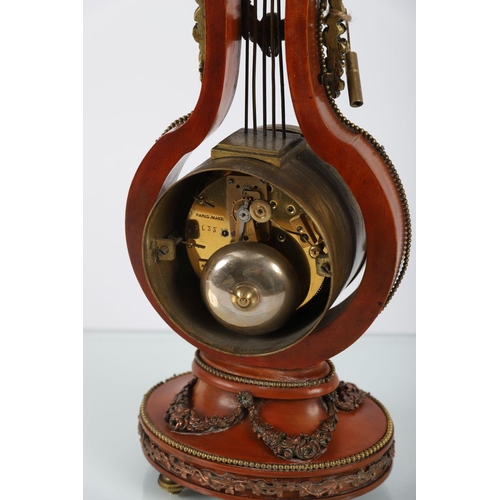 794 - 19TH-CENTURY FRENCH ORMOLU MOUNTED LYRE CLOCK