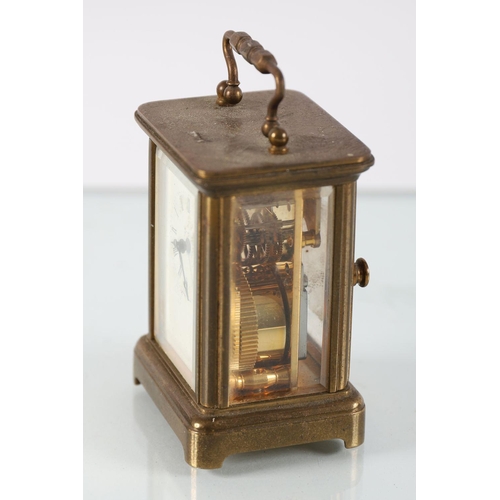 174 - EDWARDIAN BRASS MINIATURE CARRIAGE CLOCK