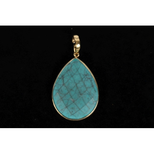 293 - GILDED SILVER AND TURQUOISE PENDANT