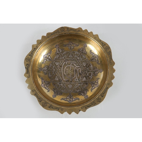 486 - 18/19TH CENTURY PERSIAN BRASS AND SILVER INLAID CHARGER