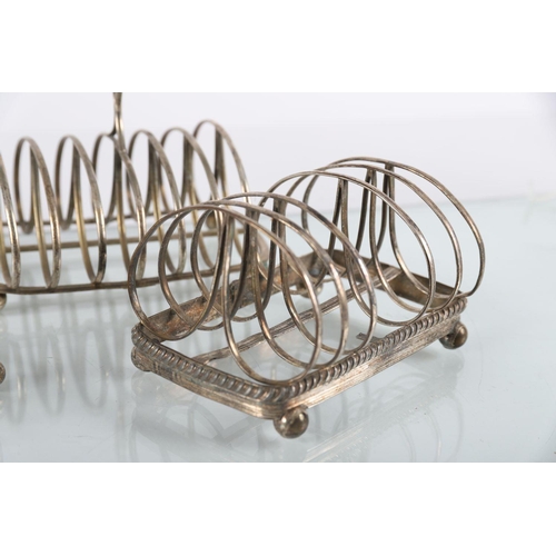 635 - GROUP OF SIX SILVER-PLATED TOAST RACKS