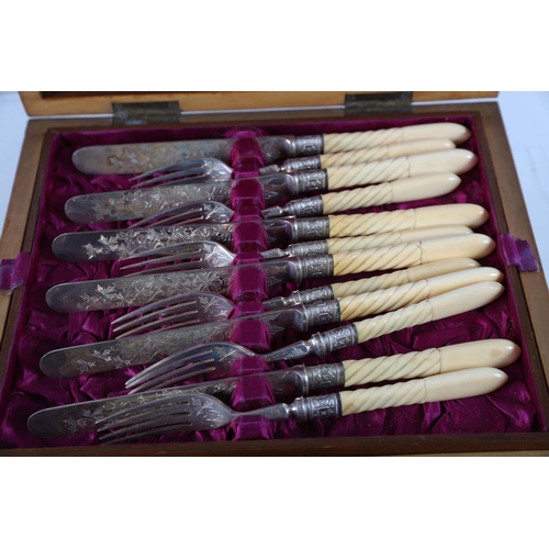 639 - CASED SET OF EDWARDIAN SILVER-PLATED FRUIT KNIVES AND FORKS