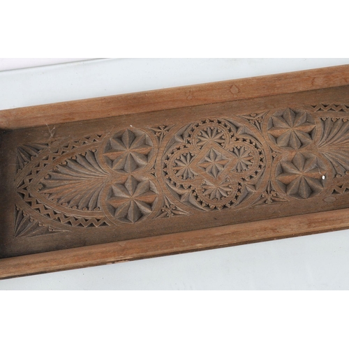 689 - EDWARDIAN CARVED TWO-HANDLED TRAY