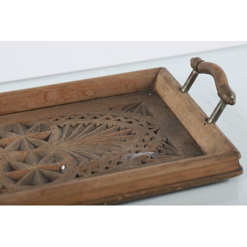 689 - EDWARDIAN CARVED TWO-HANDLED TRAY