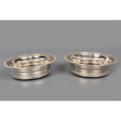 1300 - PAIR IRISH SILVER WINE COASTERS