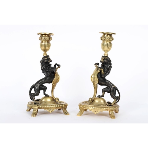 17 - PAIR 19TH-CENTURY BRONZE & BRASS ARMORIAL CANDLESTICKS