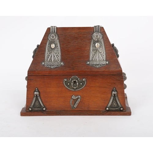 469 - IRISH LATE 19TH-CENTURY CELTIC REVIVAL OAK AND SILVER-MOUNTED STATIONERY BOX