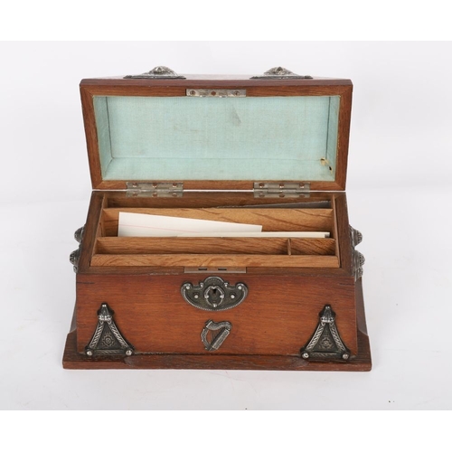 469 - IRISH LATE 19TH-CENTURY CELTIC REVIVAL OAK AND SILVER-MOUNTED STATIONERY BOX