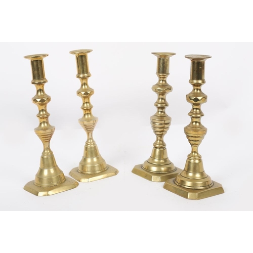 498 - LOT OF 4 GEORGIAN BRASS CANDLESTICKS