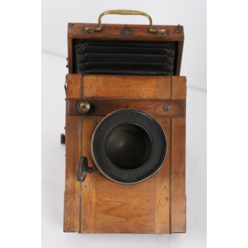 65 - MAHOGANY FOLDING CAMERA