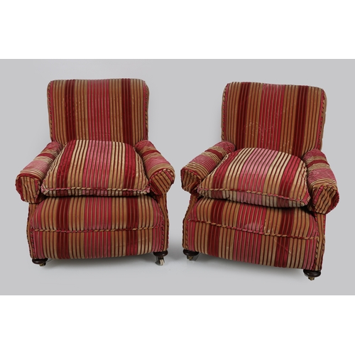 292 - PAIR 19TH-CENTURY HOWARD & SON STYLE ARMCHAIRS each with a scroll back and scroll front arms, raised... 